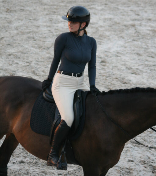grey sun shirt in the saddle