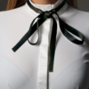 black self-tie bowtie and white competition shirt